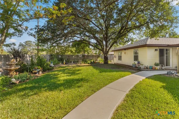 a view of a house with a big yard