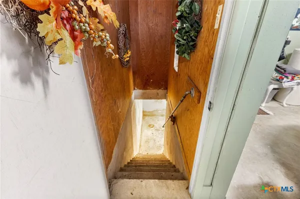 wooden floor in a gallery next to a window