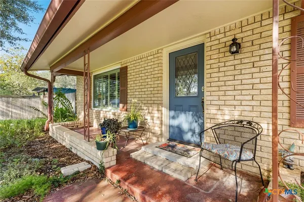 a building outdoor space with patio furniture