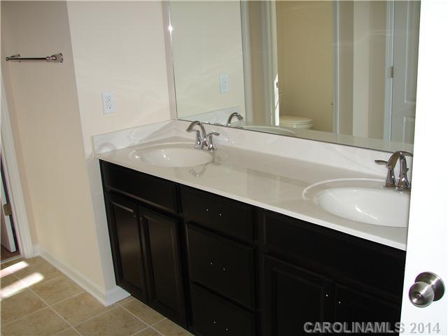 4110 Perth Road, Unit 225 Indian Land, SC 29707 - Photo 5 of 6 a bathroom with a sink and a mirror