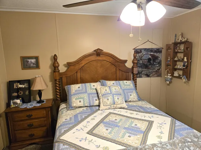 a view of a chairs and table in the balcony
