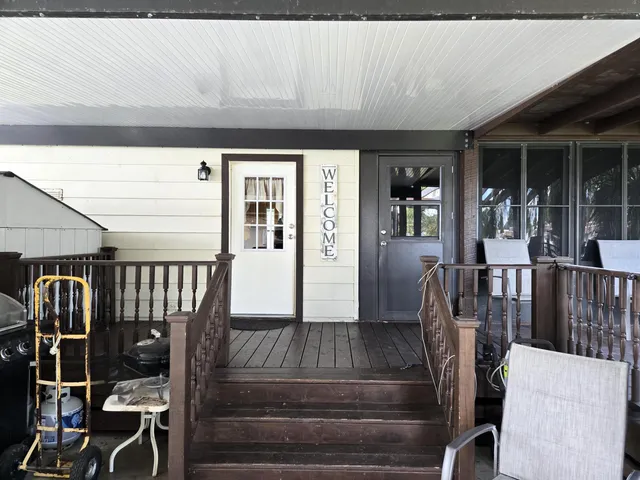 an aerial view of a yard with seating area