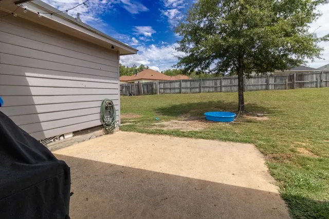 a view of a backyard with a garden