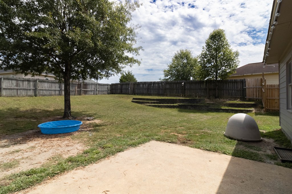 3381 Flintlock Drive Columbus, GA 31907 - Photo 33 of 39 a swimming pool with wooden fence