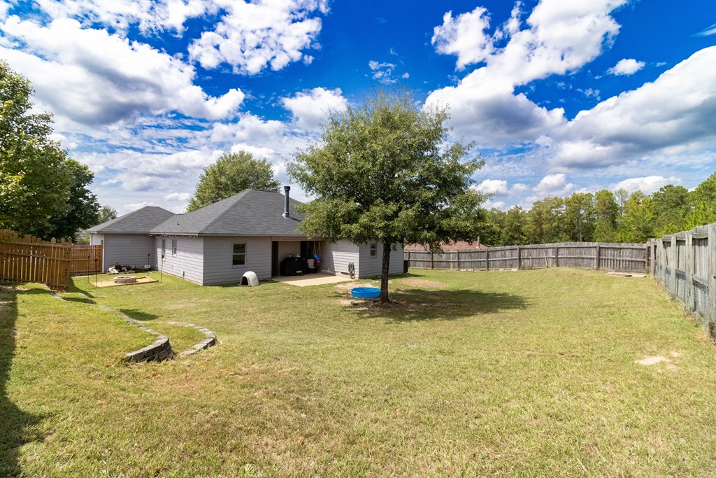 3381 Flintlock Drive Columbus, GA 31907 - Photo 38 of 39 a view of a house with swimming pool and sitting area