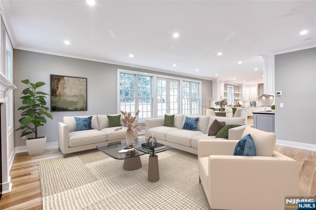 57 Mill Road Park Ridge, NJ 07656 - Photo 15 of 50 a living room with furniture and a large window