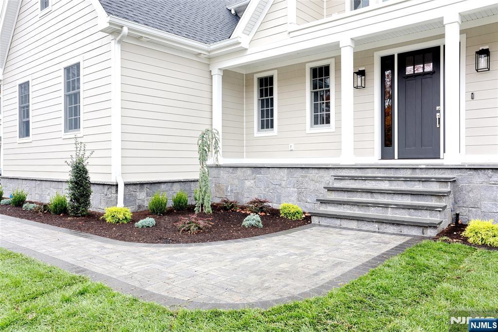 57 Mill Road Park Ridge, NJ 07656 - Photo 3 of 50 a front view of a house