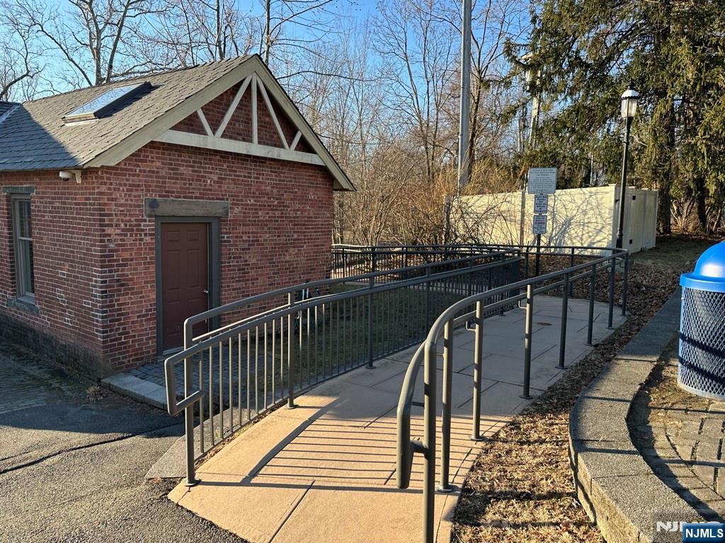 57 Mill Road Park Ridge, NJ 07656 - Photo 45 of 50 a view of a wooden deck front of house