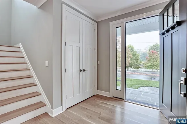 a view of an entryway with staircase