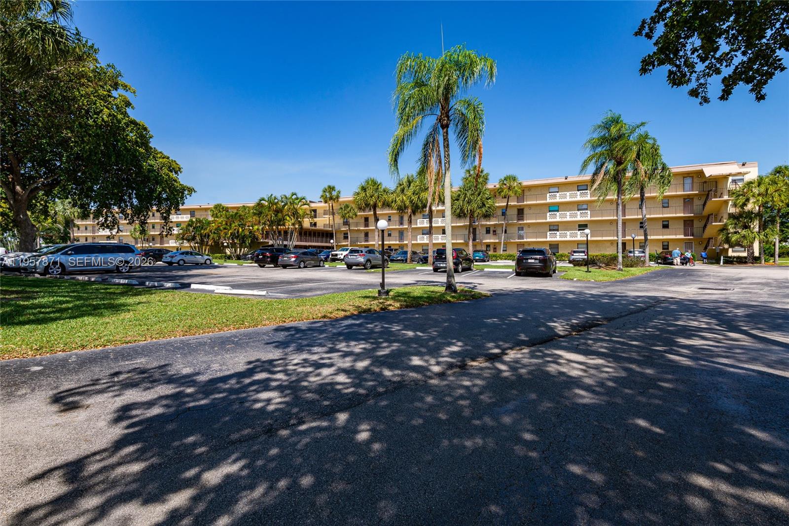 9355 Southwest 8th Street, Unit 105 Boca Raton, FL 33428 - Photo 32 of 37 a view of a water fountain in front of a house