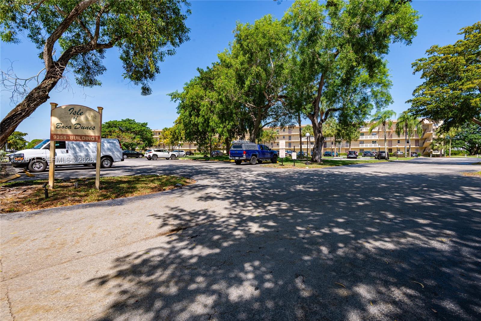 9355 Southwest 8th Street, Unit 105 Boca Raton, FL 33428 - Photo 33 of 37 a view of a street with houses