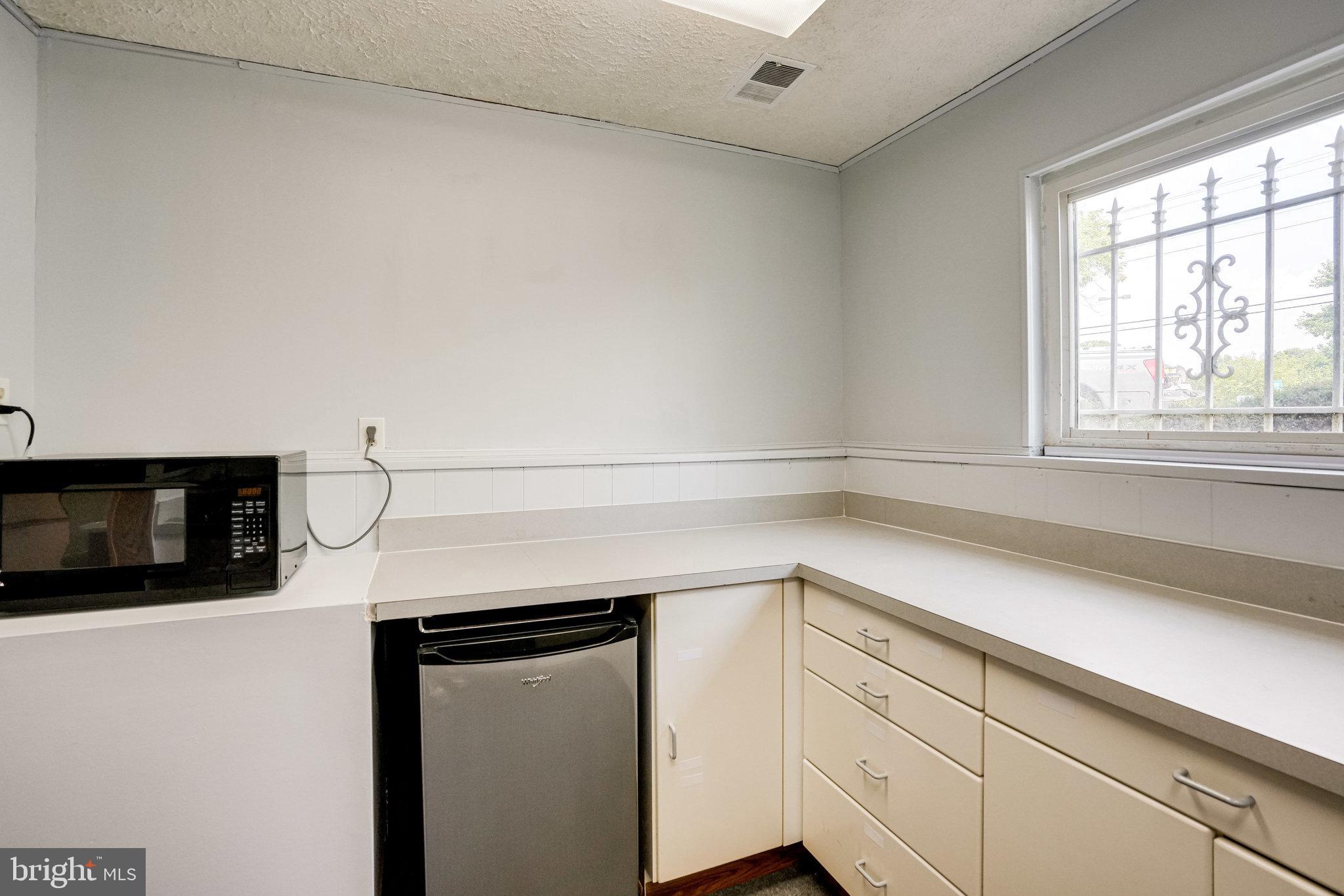 809 Swan Creek Road East Fort Washington, MD 20744 - Photo 45 of 64 microwave and new fridge
