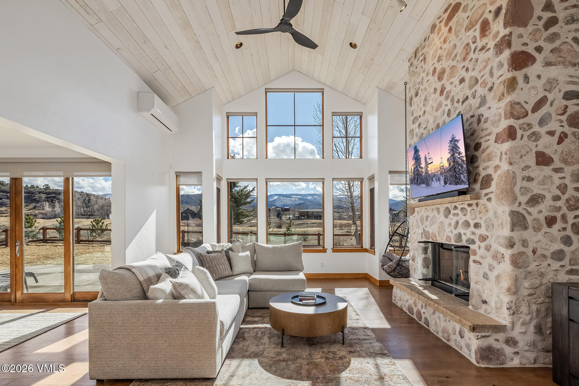 2044 Eagle Ranch Road Eagle, CO 81631 - Photo 1 of 39 a living room with furniture and a fireplace