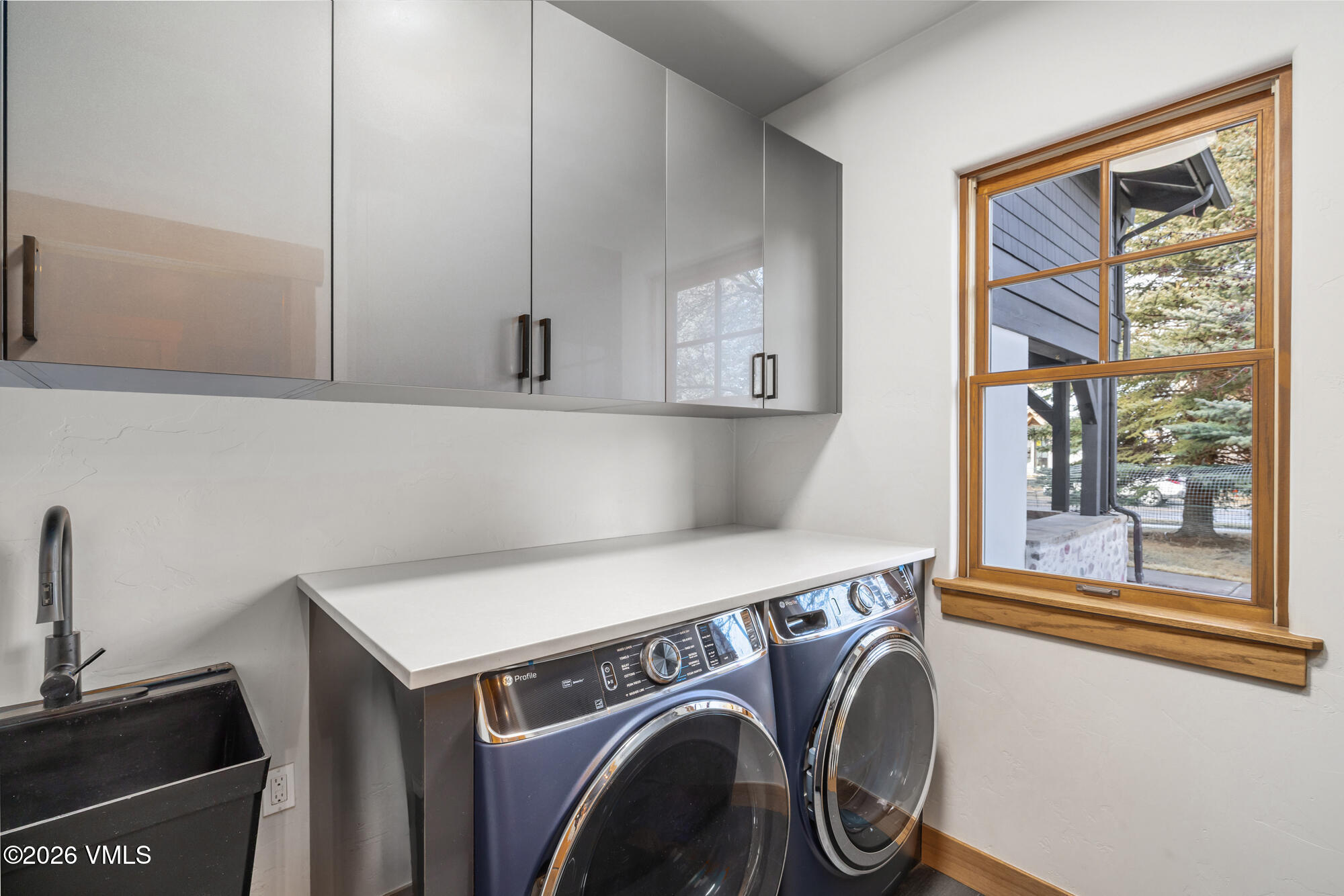 2044 Eagle Ranch Road Eagle, CO 81631 - Photo 11 of 39 a utility room with dryer and washer