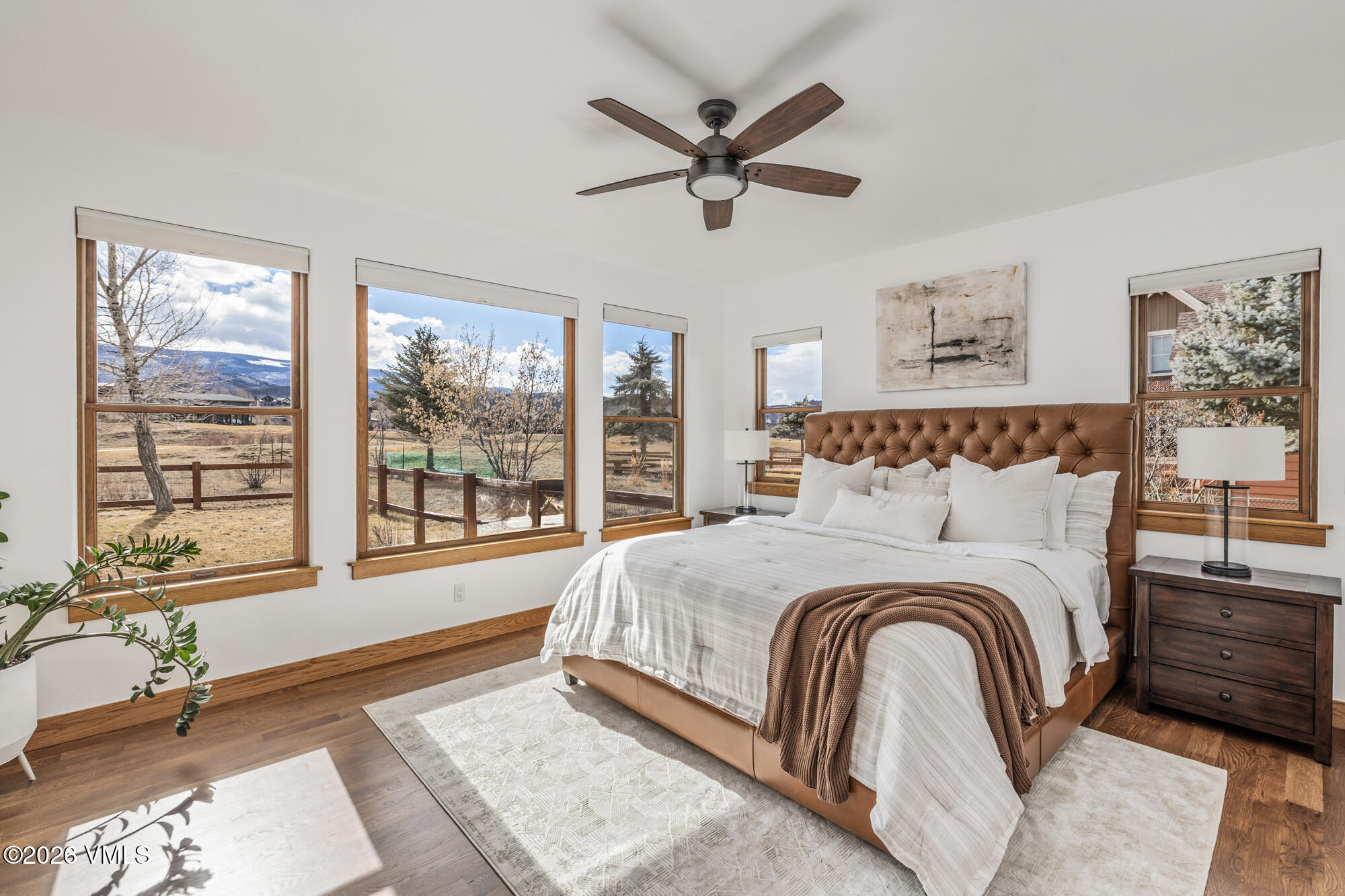 2044 Eagle Ranch Road Eagle, CO 81631 - Photo 12 of 39 a bedroom with a large bed and a window