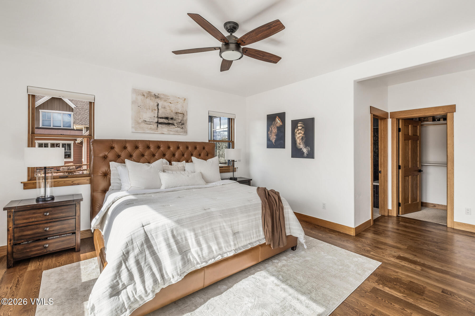 2044 Eagle Ranch Road Eagle, CO 81631 - Photo 13 of 39 a bedroom with bed and wooden floor