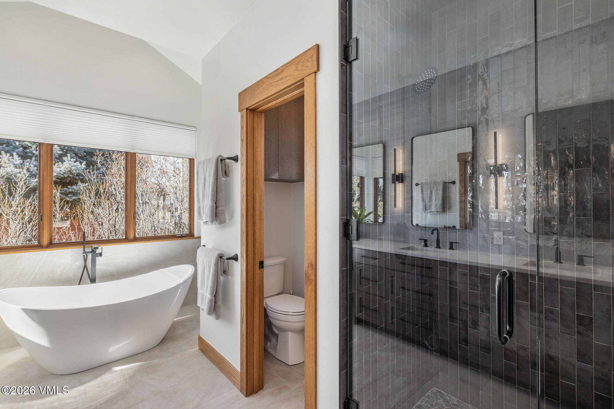 2044 Eagle Ranch Road Eagle, CO 81631 - Photo 15 of 39 a bathroom with a white tub shower and sink