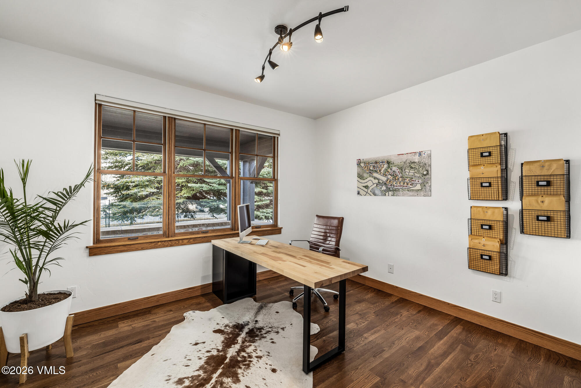 2044 Eagle Ranch Road Eagle, CO 81631 - Photo 16 of 39 a view of a workspace with furniture and a window