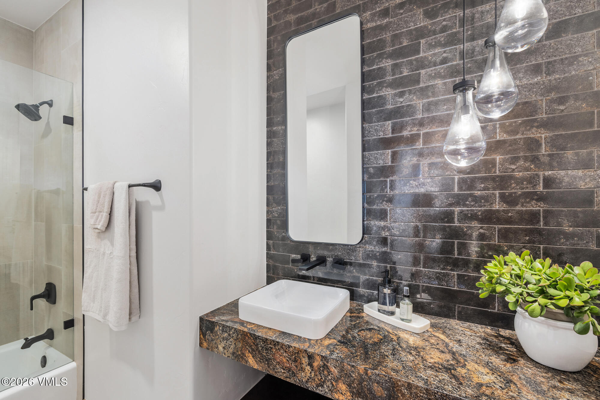 2044 Eagle Ranch Road Eagle, CO 81631 - Photo 17 of 39 a bathroom with a sink and a mirror
