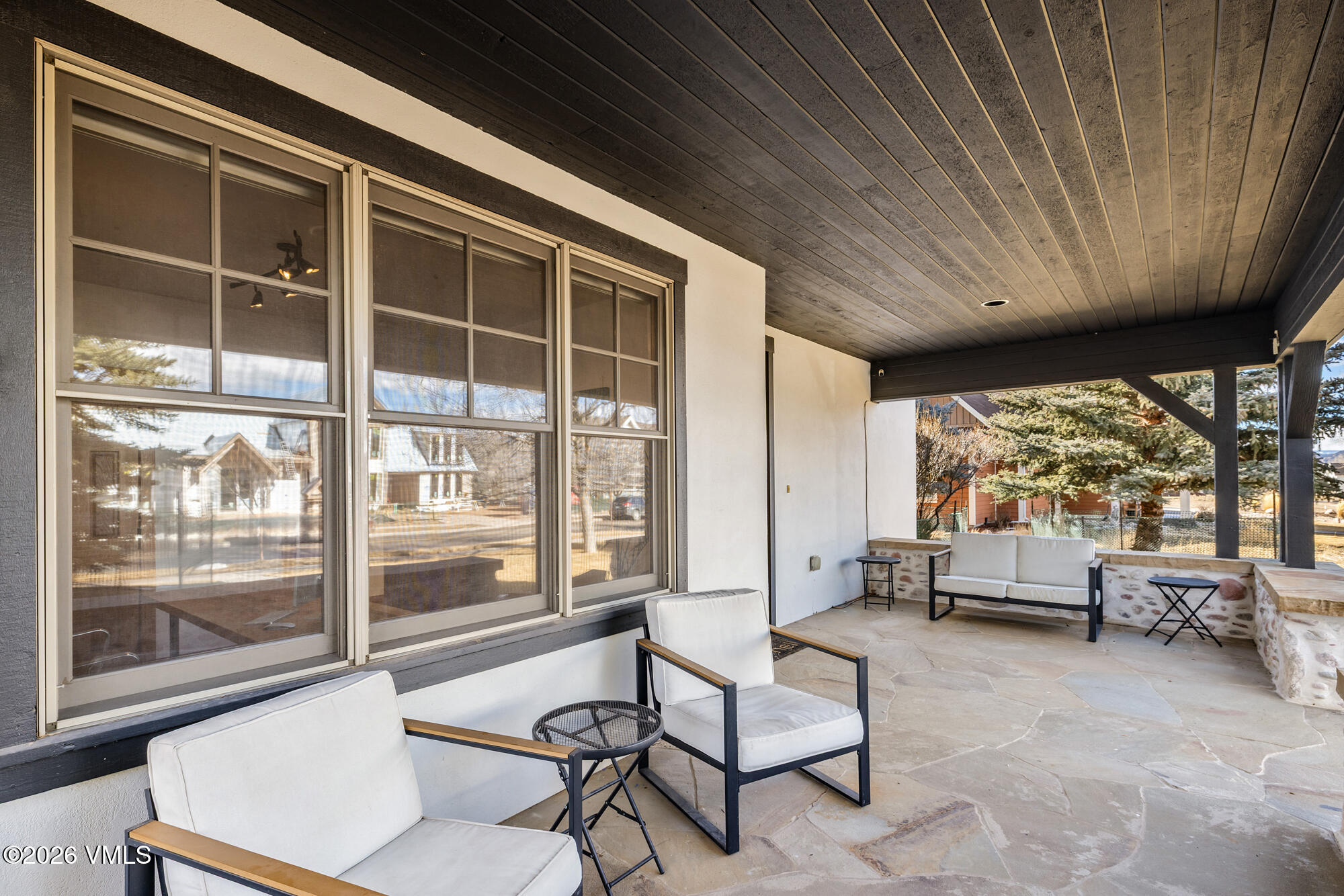 2044 Eagle Ranch Road Eagle, CO 81631 - Photo 25 of 39 a living room with furniture and a large window