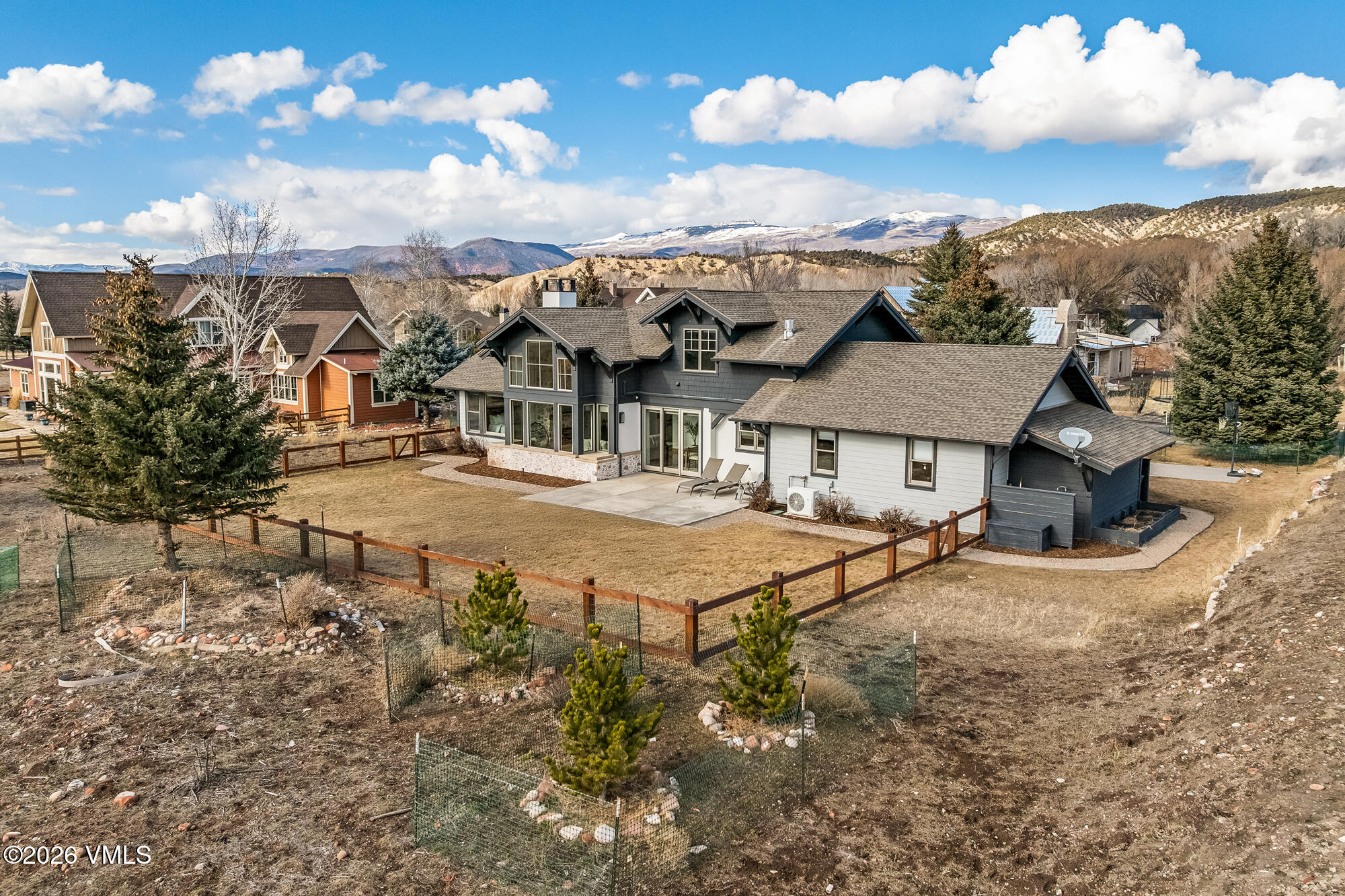 2044 Eagle Ranch Road Eagle, CO 81631 - Photo 29 of 39 a view of a house with a big yard and large trees