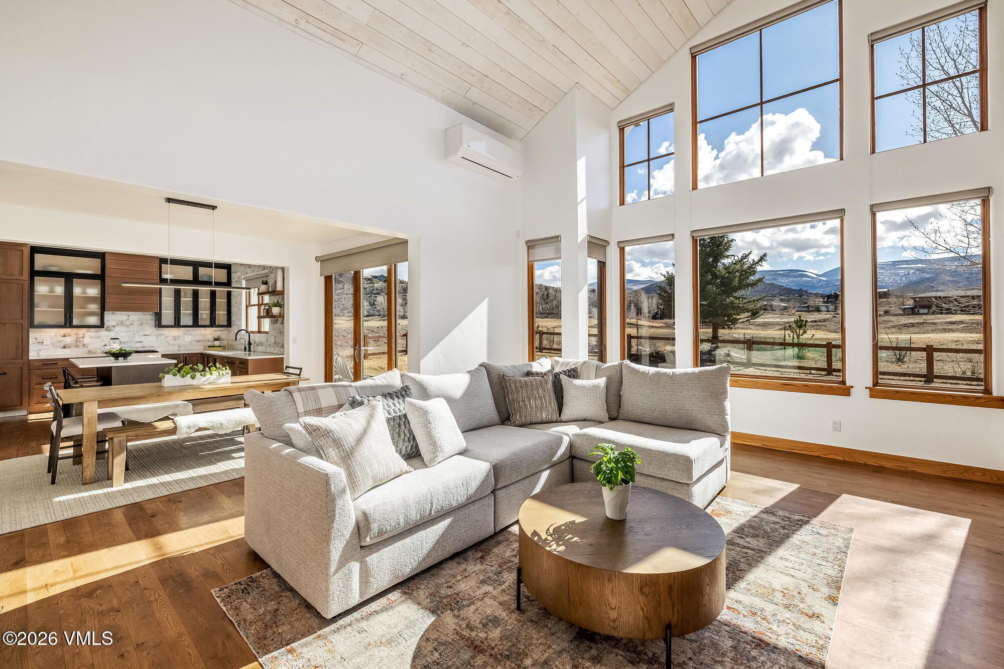 2044 Eagle Ranch Road Eagle, CO 81631 - Photo 3 of 39 a living room with furniture and a large window