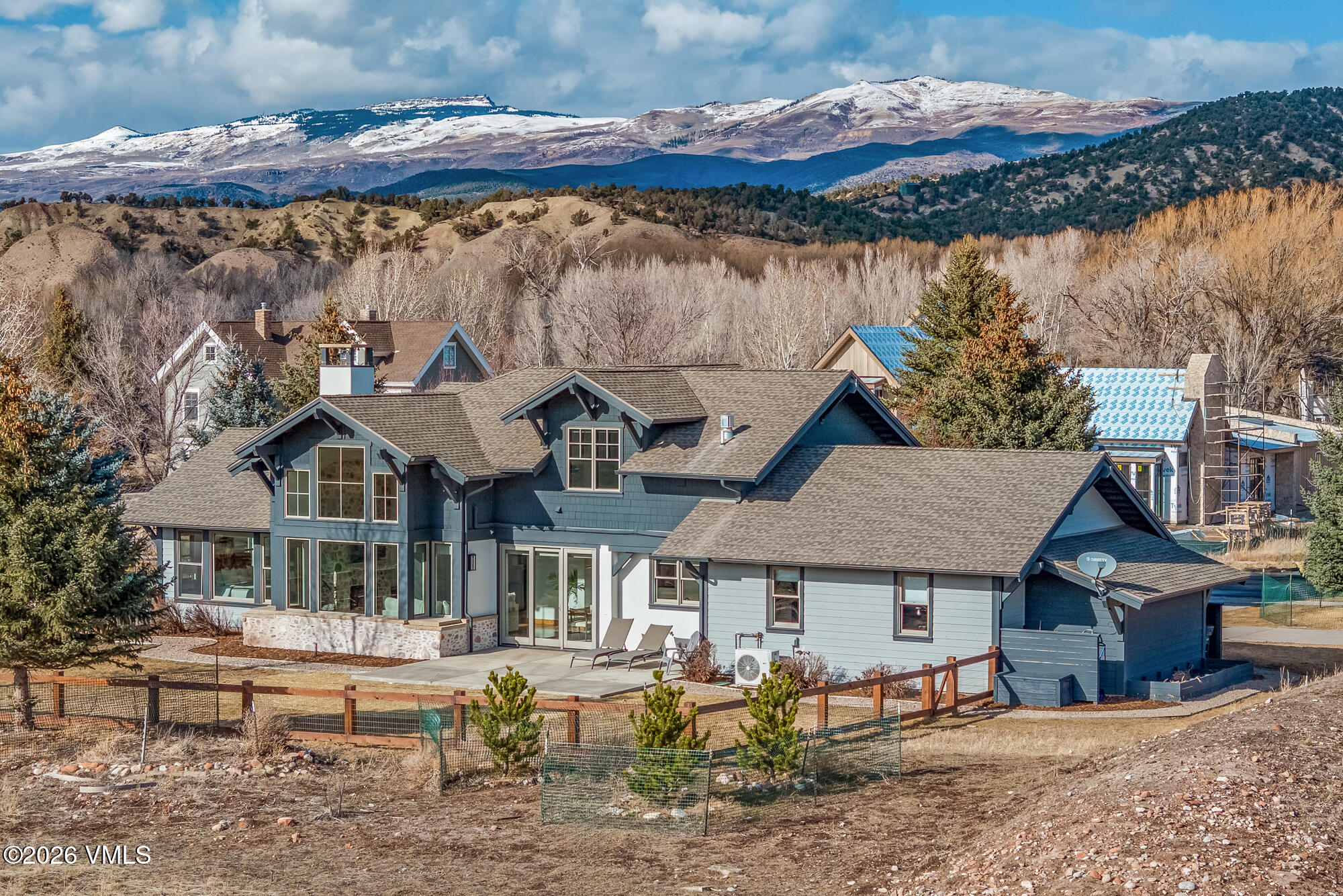 2044 Eagle Ranch Road Eagle, CO 81631 - Photo 33 of 39 a front view of house with a garden and patio