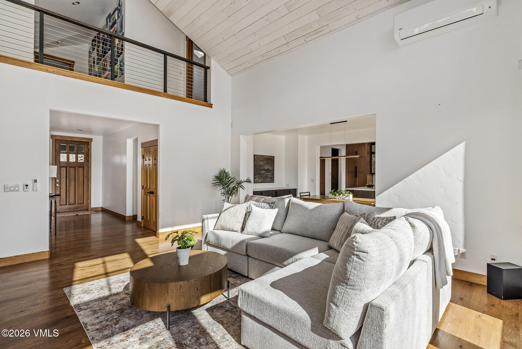 2044 Eagle Ranch Road Eagle, CO 81631 - Photo 4 of 39 a living room with furniture and wooden floor