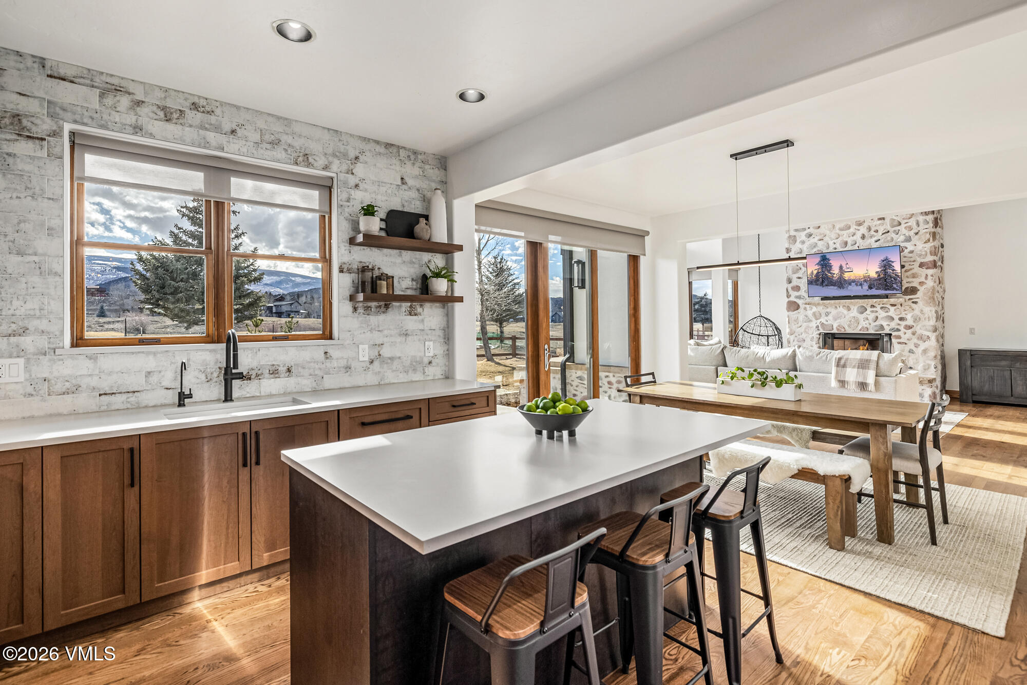 2044 Eagle Ranch Road Eagle, CO 81631 - Photo 7 of 39 a kitchen with a table and chairs in it