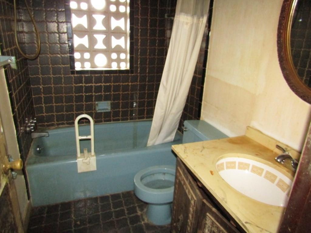 219 Camp Avenue Braddock, PA 15104 - Photo 20 of 27 a bathroom with a sink toilet and shower