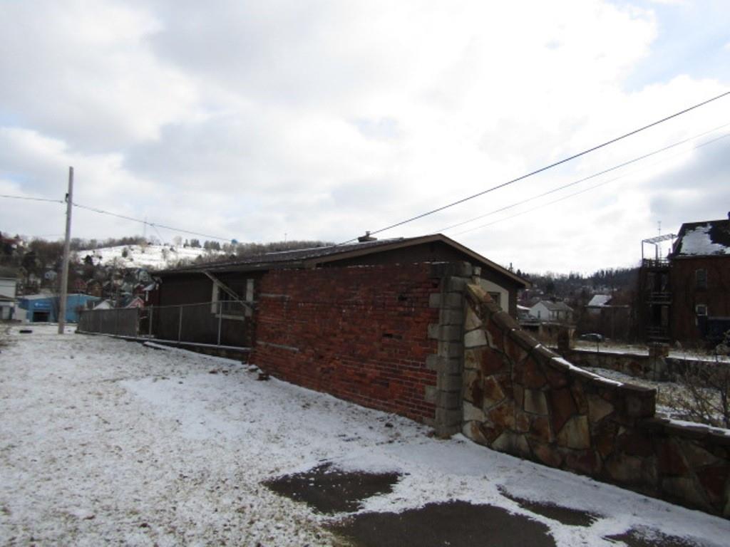 219 Camp Avenue Braddock, PA 15104 - Photo 3 of 27 a backyard of a house