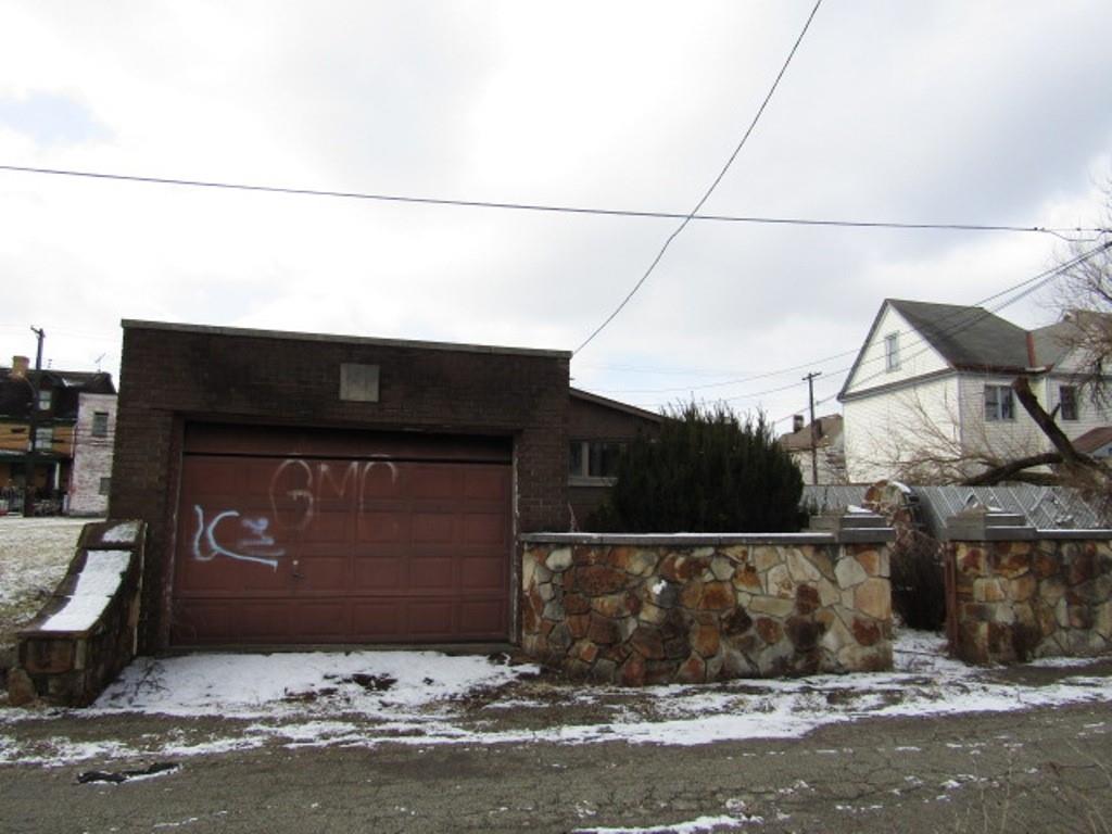 219 Camp Avenue Braddock, PA 15104 - Photo 5 of 27 a front view of a house
