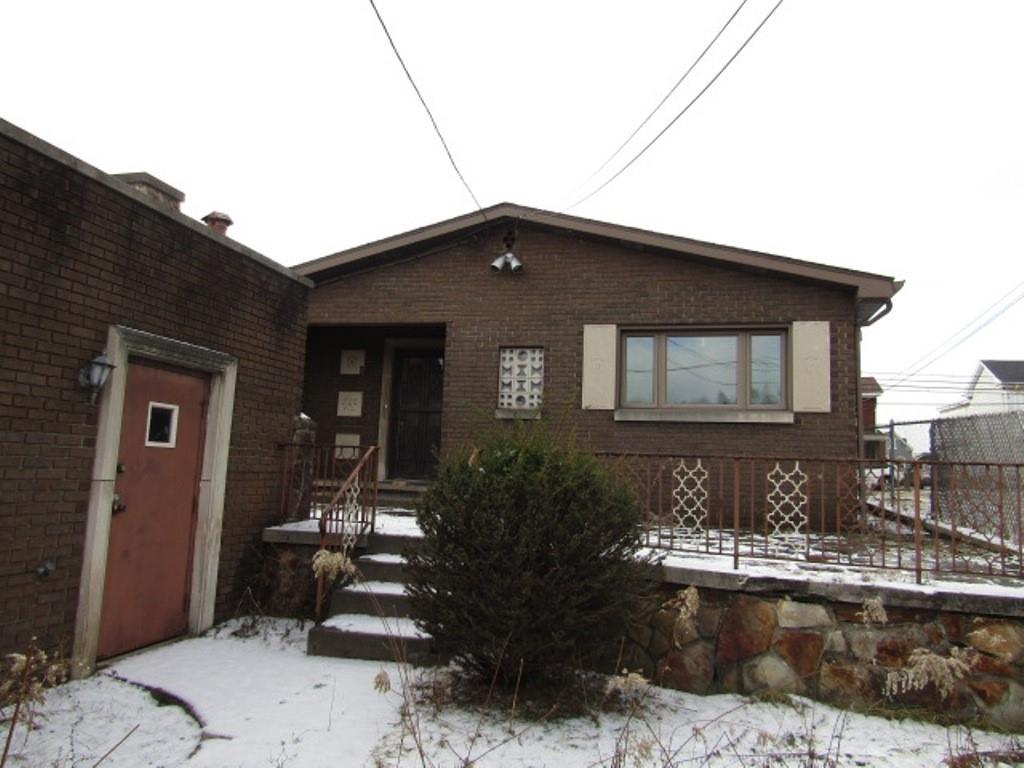 219 Camp Avenue Braddock, PA 15104 - Photo 6 of 27 a front view of a house