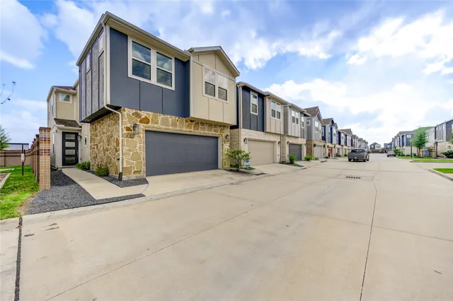 a street view along with residential houses