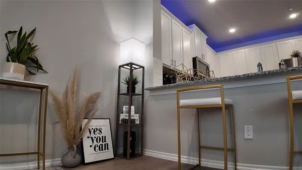 a view of a hallway with entryway