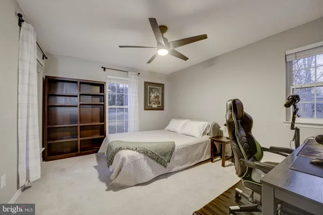 a view of bathroom with dual sinks