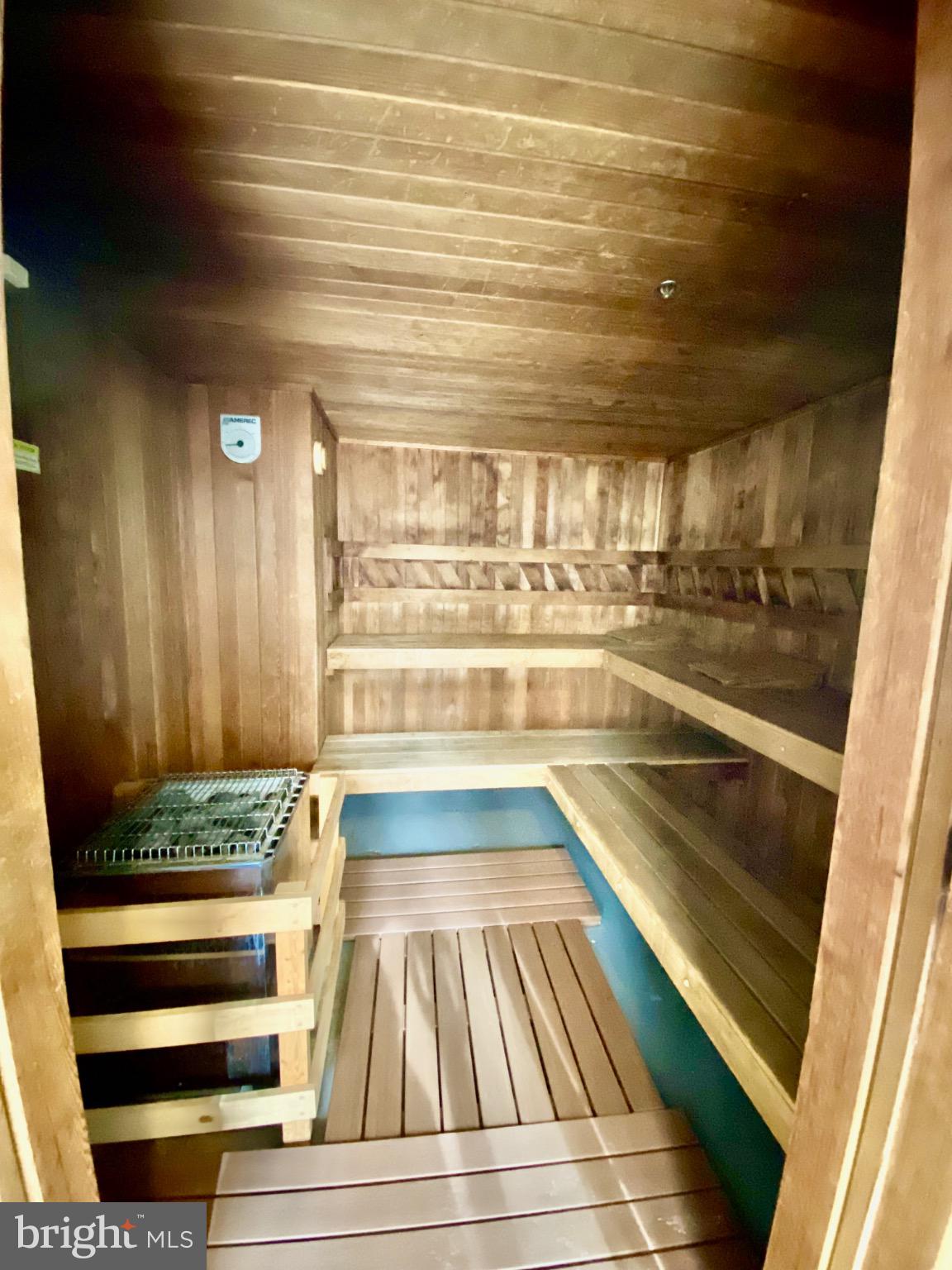 1501 Lincoln Way, Unit 101 McLean, VA 22102 - Photo 20 of 23 a view of walk in closet with wooden floor