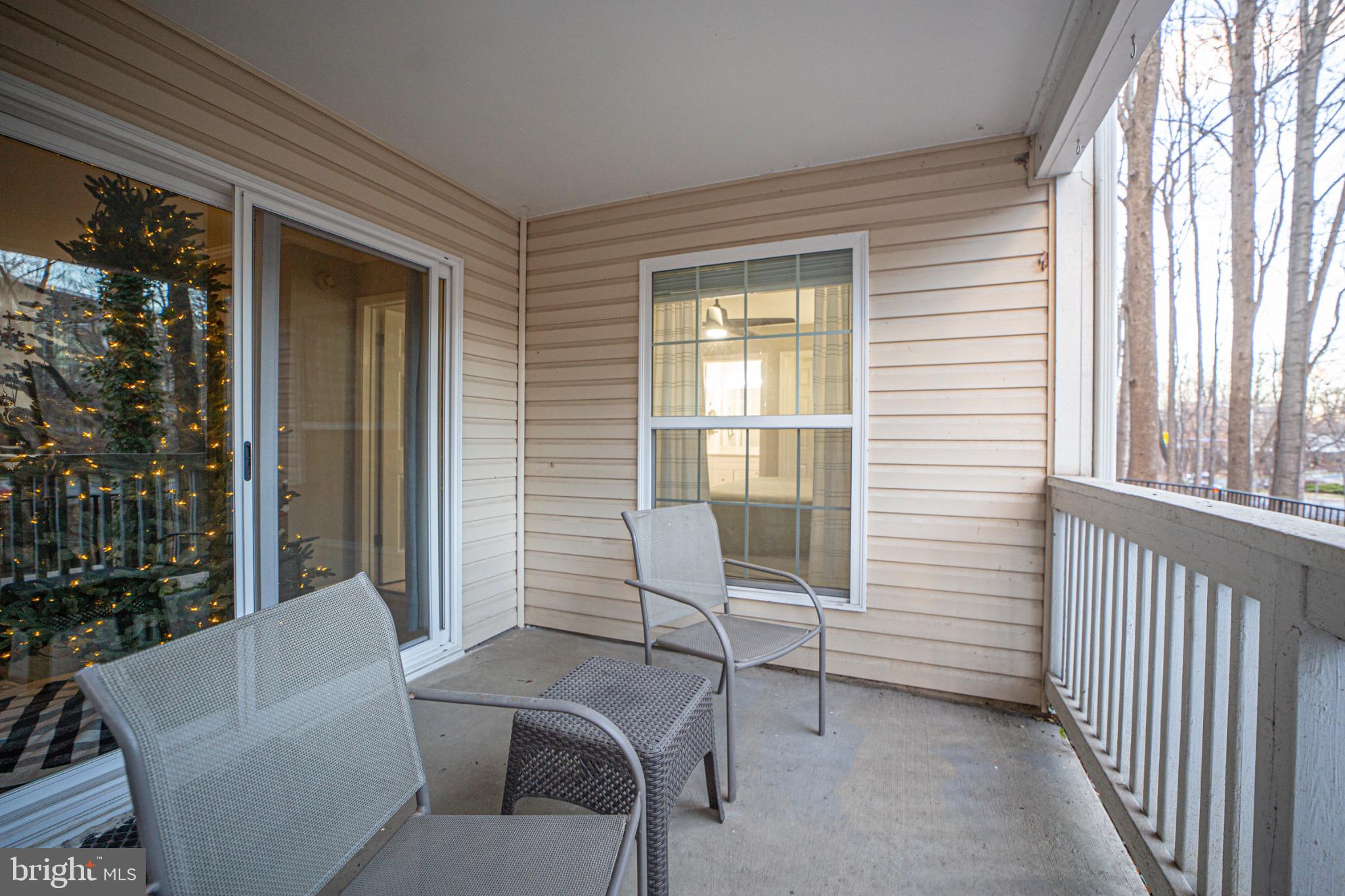 1501 Lincoln Way, Unit 101 McLean, VA 22102 - Photo 3 of 23 a living room with furniture and a window