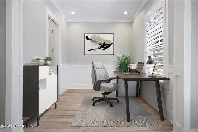 a workspace with furniture and window