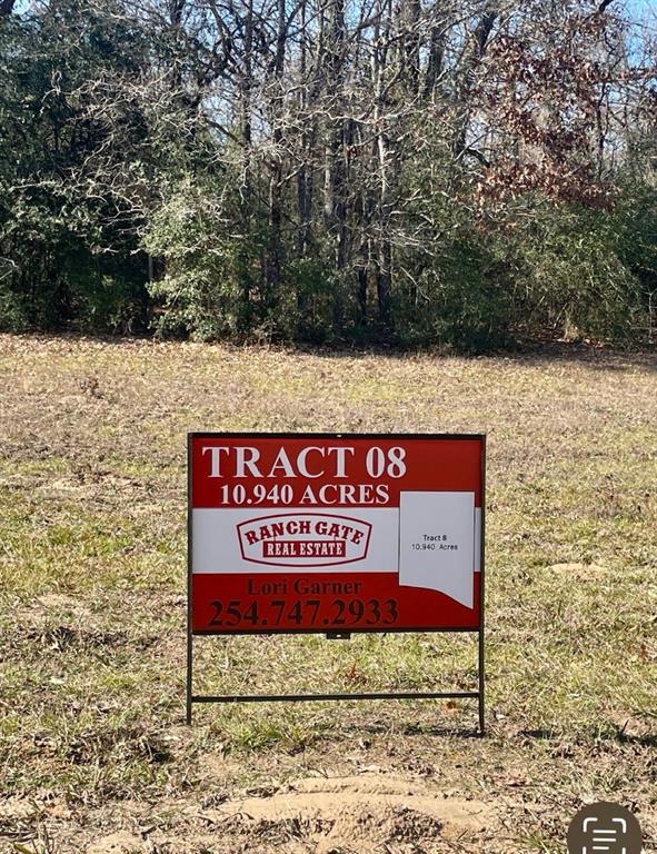 008 County Road Oakwood, TX 75855 - Photo 5 of 7 a sign on the side of a building