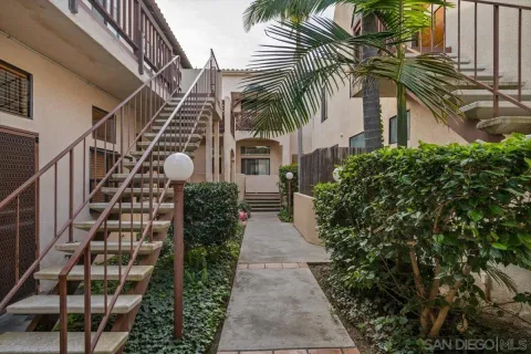 a view of a pathway with a house