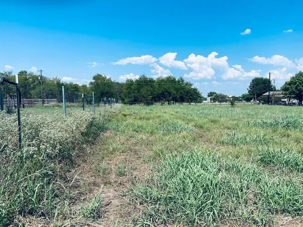 a view of outdoor space with deck and yard