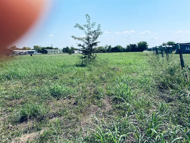 a view of lake with green space
