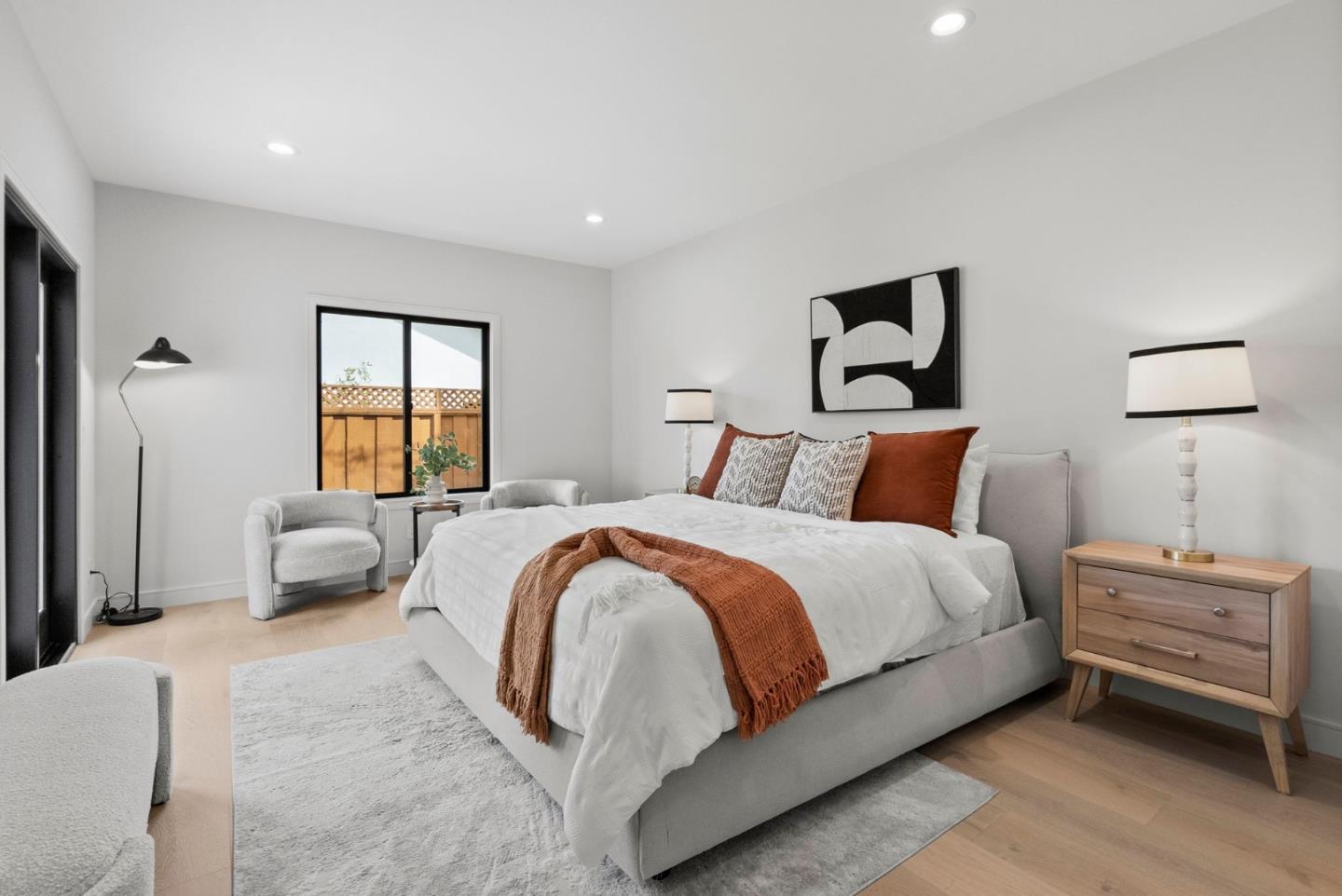 829 Sutter Avenue Sunnyvale, CA 94086 - Photo 13 of 36 a bedroom with a bed and a couch