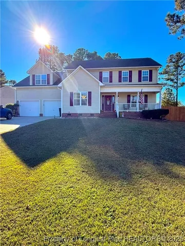 a view of swimming pool with outdoor seating