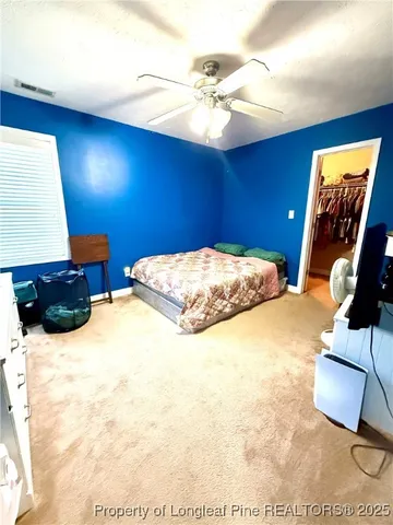 a bathroom with a sink toilet and mirror