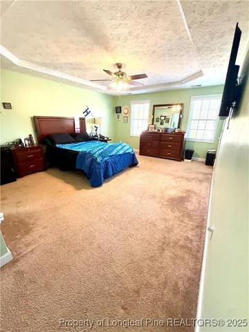 a bathroom with a bathtub and a window