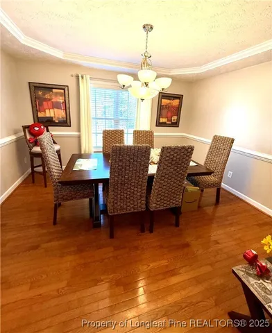 a bathroom with a toilet and a mirror