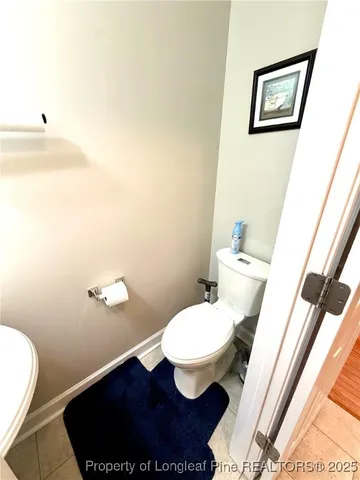 a kitchen with stainless steel appliances granite countertop a stove top oven a sink a counter top space and cabinets