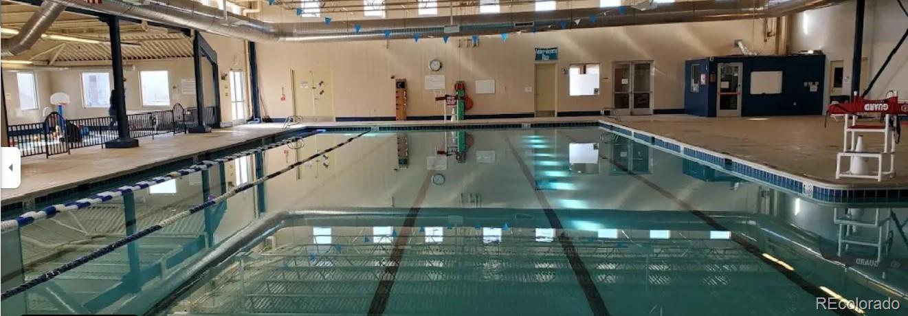 640 Aspen Avenue Bennett, CO 80102 - Photo 14 of 16 a view of a swimming pool